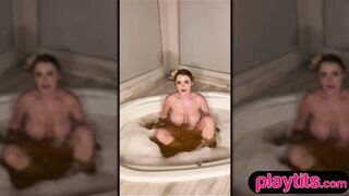 Sophie Dee, the busty mature MILF, gets soapy wet & rubs her soapy pussy in bathtub