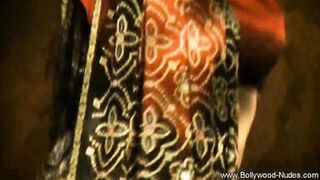 Watch India, the exotic Arabian MILF, tease and strip in a softcore striptease - 13 image