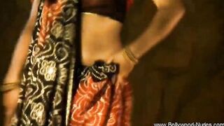 Watch India, the exotic Arabian MILF, tease and strip in a softcore striptease - 5 image
