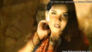 Watch India, the exotic Arabian MILF, tease and strip in a softcore striptease